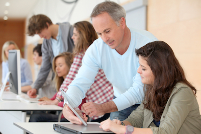 Group of students attending training course at school